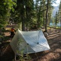 How can i find a campsite with a lake or river nearby?